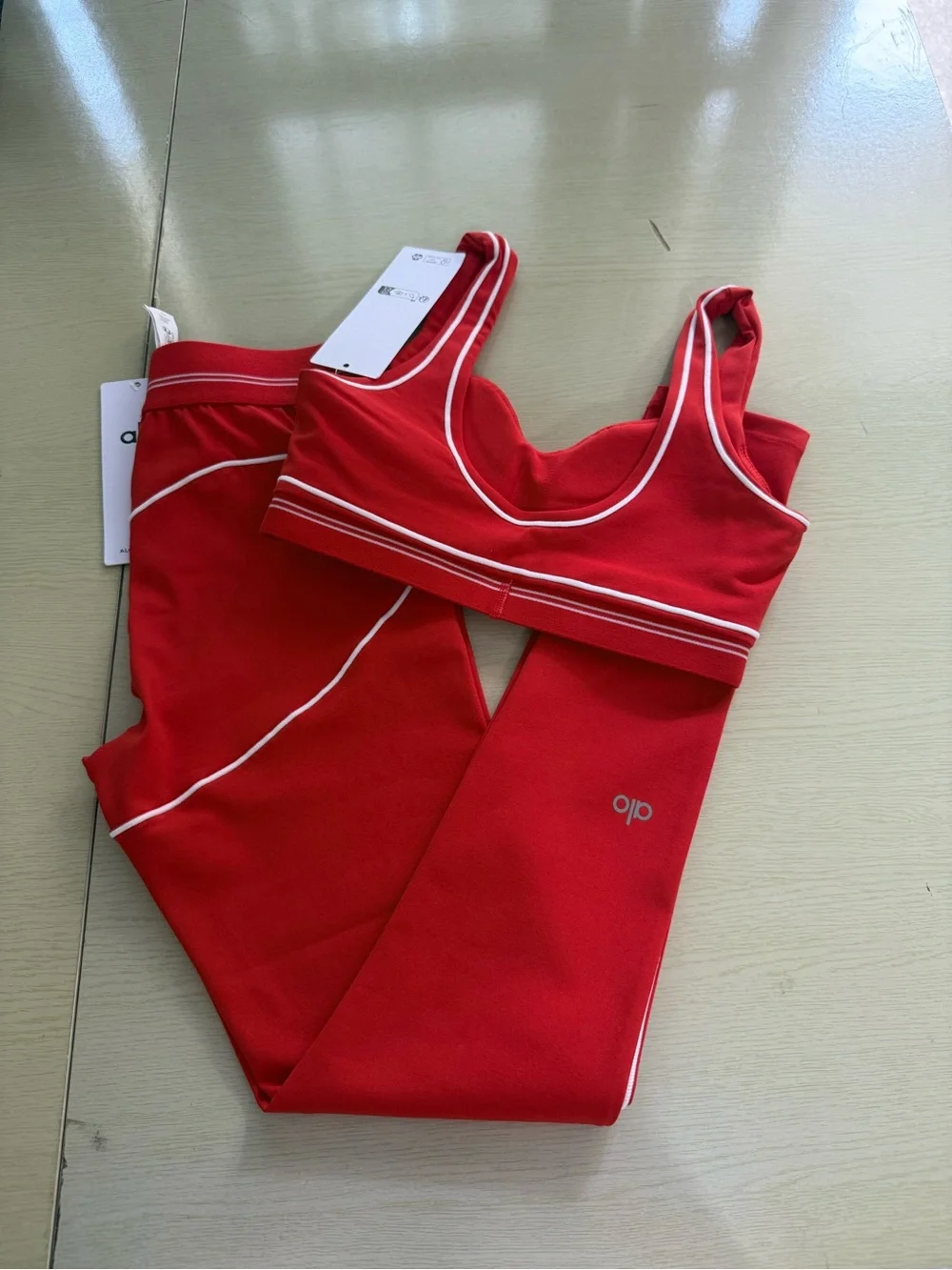 ALO Yoga Red Sports Bra with White Piping